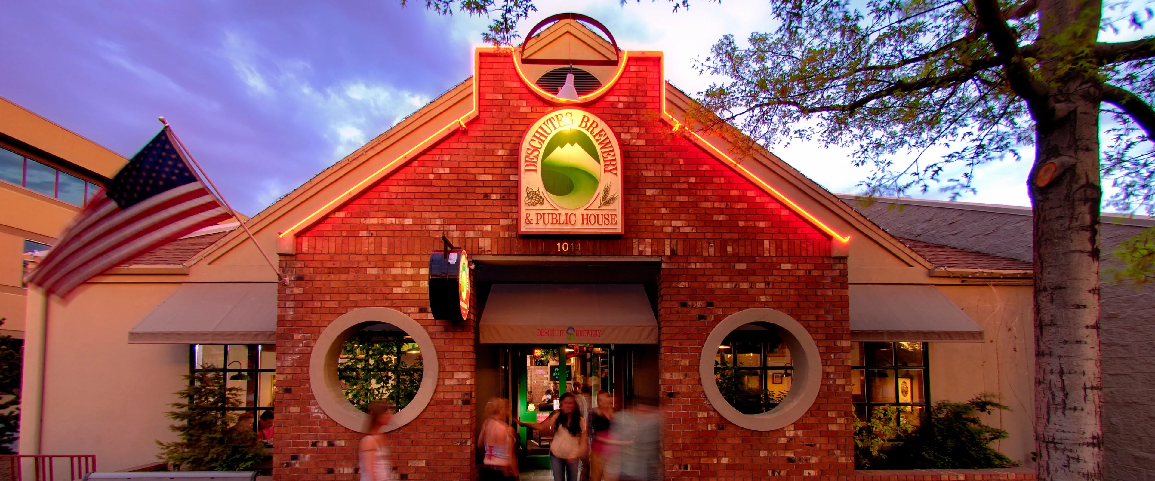 An exterior view of the Deschutes Brewery - Bend Public House during summer.