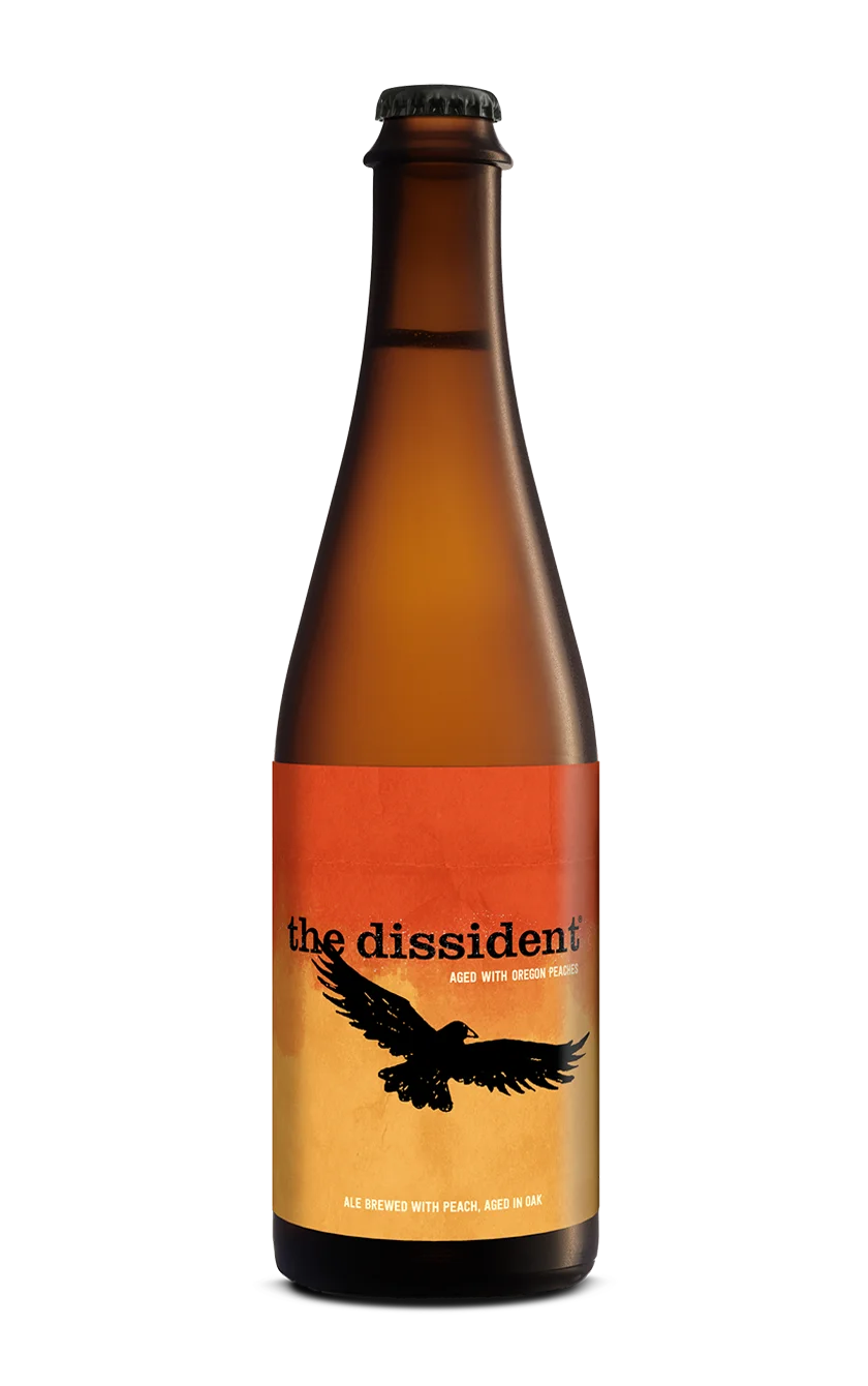 A photograph of the Dissident Peach beer bottle.