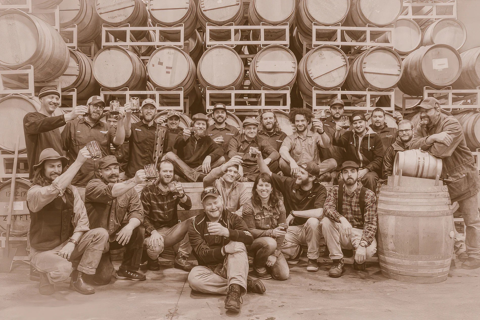 A sepia-toned photograph of the Deschutes brewing team.