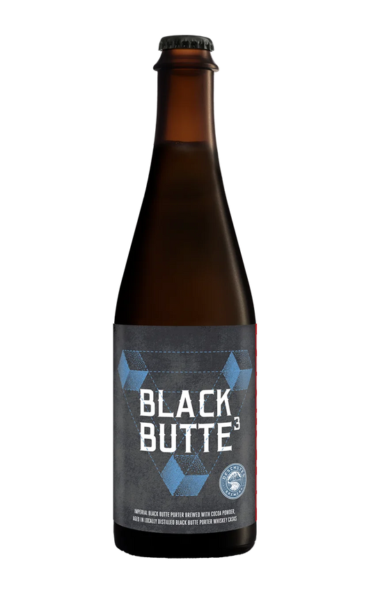 A photograph of the Black Butte Three beer bottle.