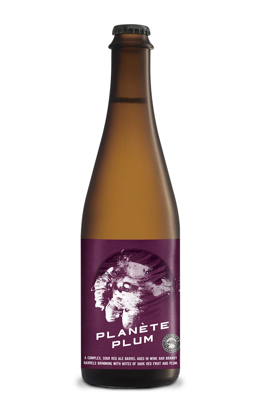 A photograph of the Planete Plum beer bottle.