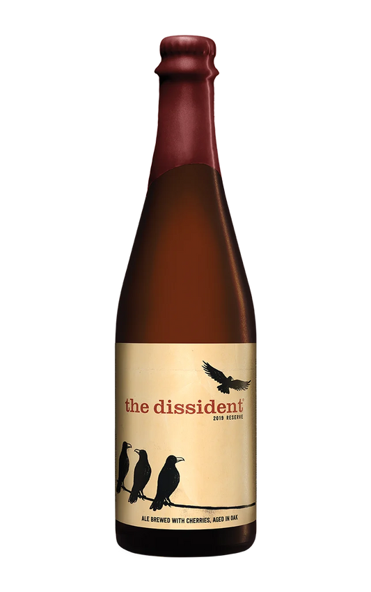 A photograph of the Dissident beer bottle.